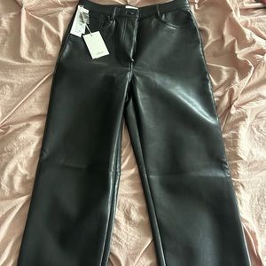 Gorgeous faux black leather pants from Aritzia. Size 4 tall.